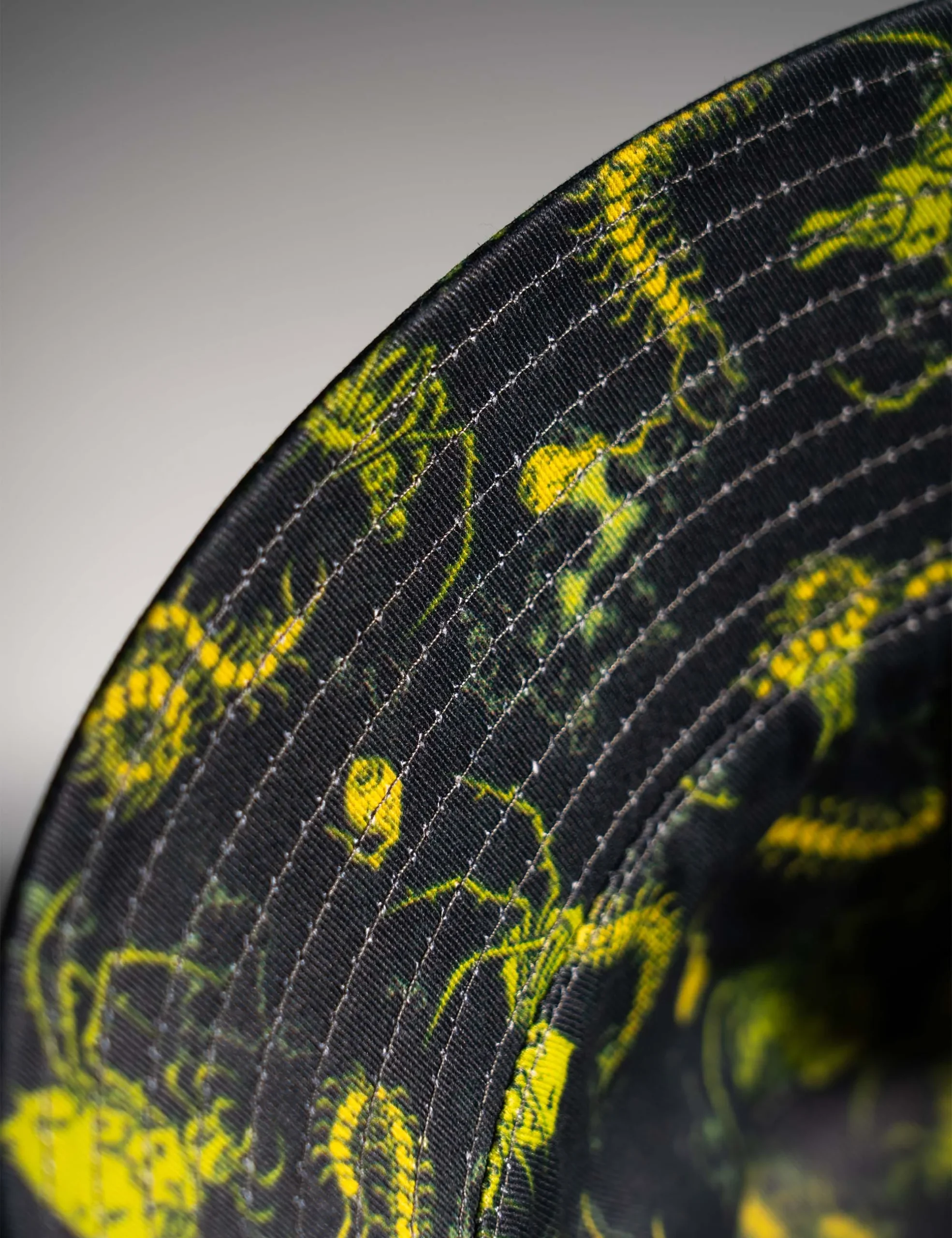 Lifestyle perspective displaying the relaxed unisex fit of the Creepy Crawlies Green Bucket Hat - Creep Cast Merch