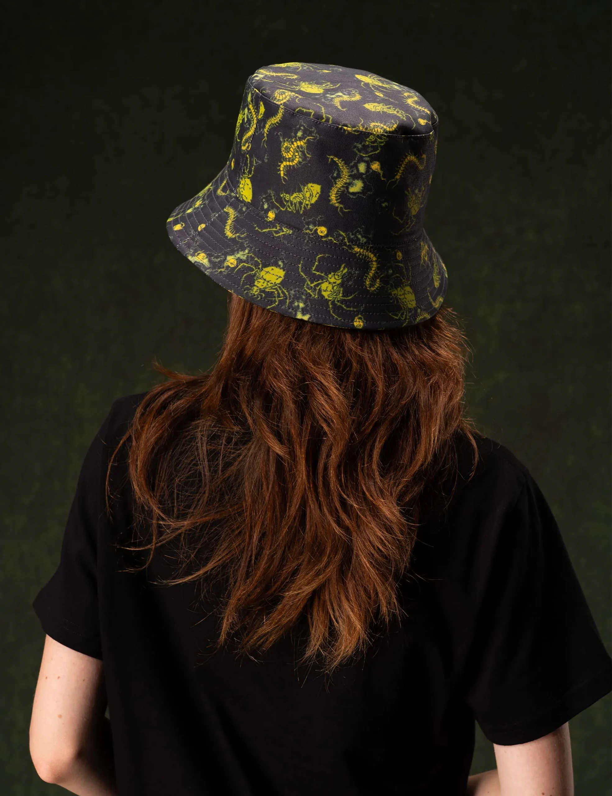 Alternative angle highlight of collar ribbing and craftsmanship on the Creepy Crawlies Green Bucket Hat - Creep Cast Merch