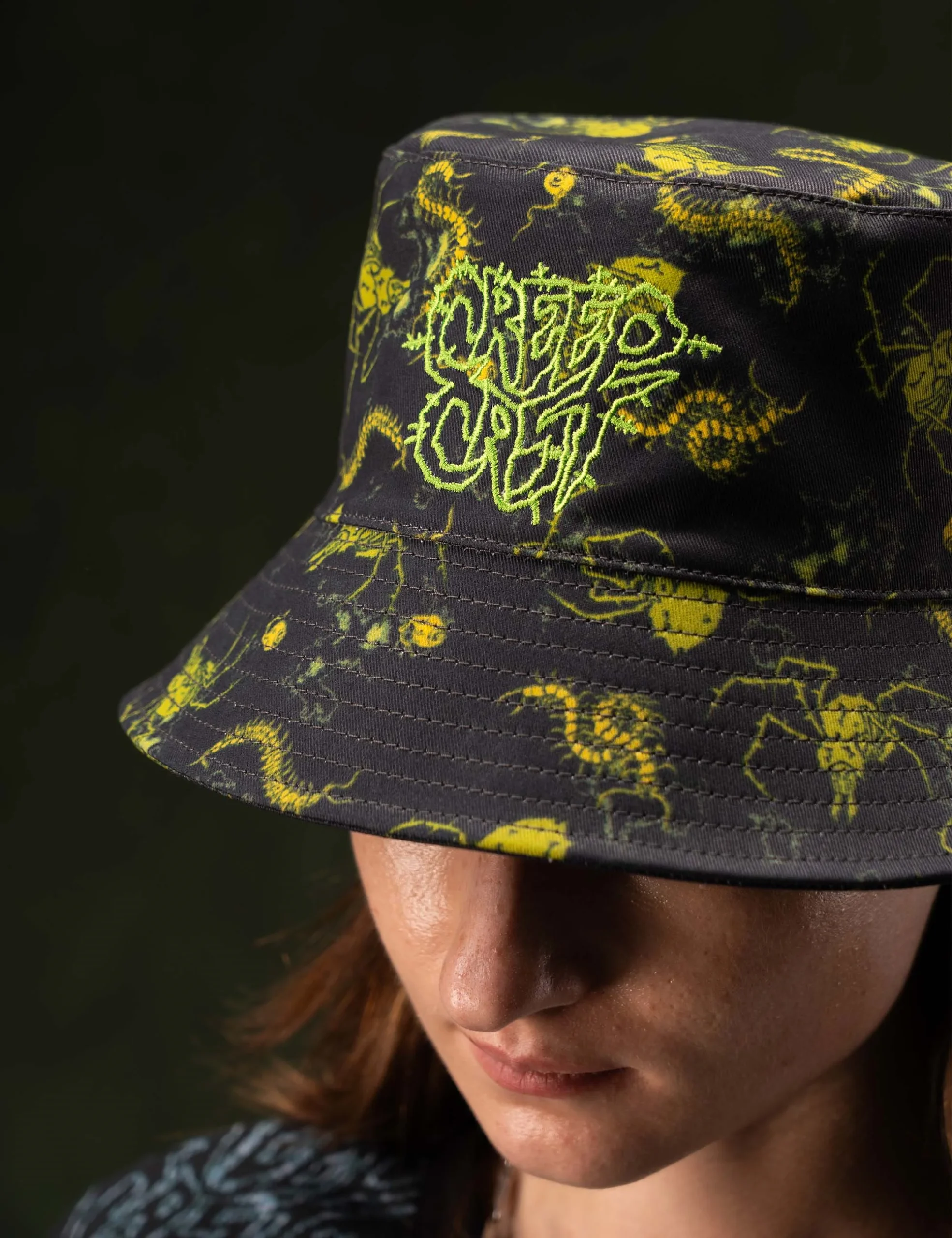 Detailed craftsmanship perspective 7 of the Creepy Crawlies Green Bucket Hat - Creep Cast Merch