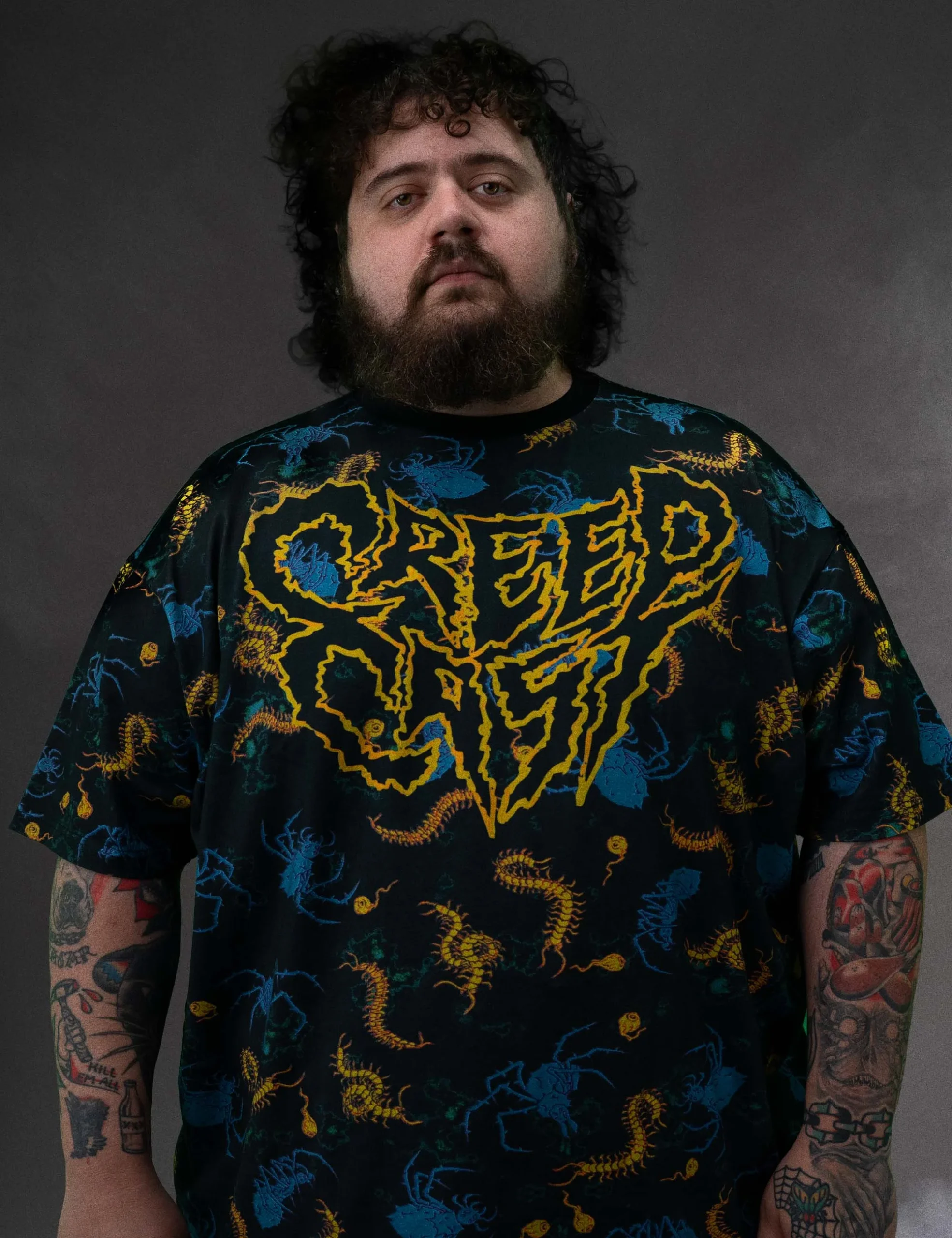 Rear perspective showing the clean back construction and hem of the Creepy Crawlies Oversized Tshirt - Creep Cast Merch