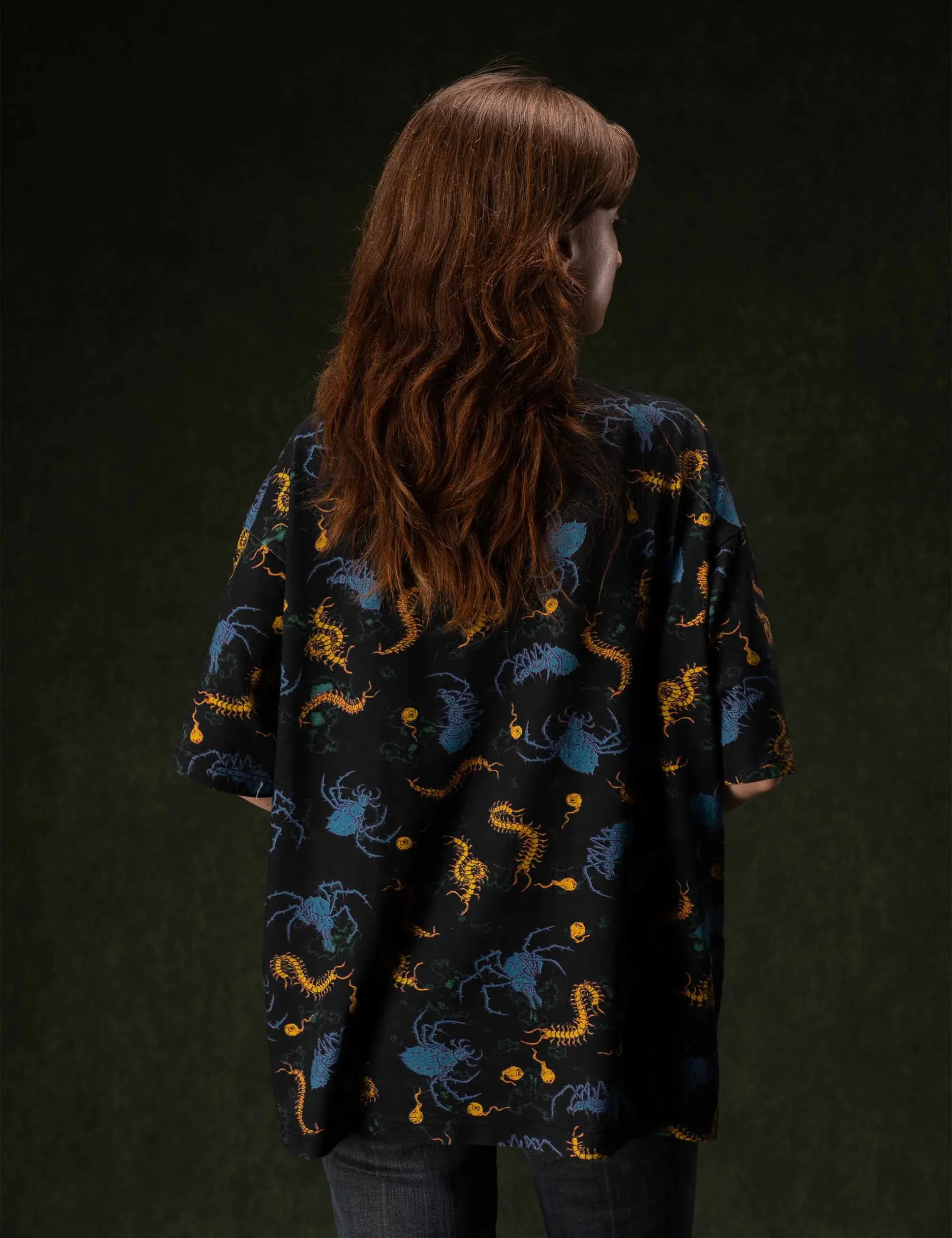 Alternative angle highlight of collar ribbing and craftsmanship on the Creepy Crawlies Oversized Tshirt - Creep Cast Merch
